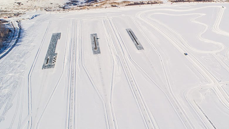 Top view μ-split area on lake polished ice and ABS tracks.